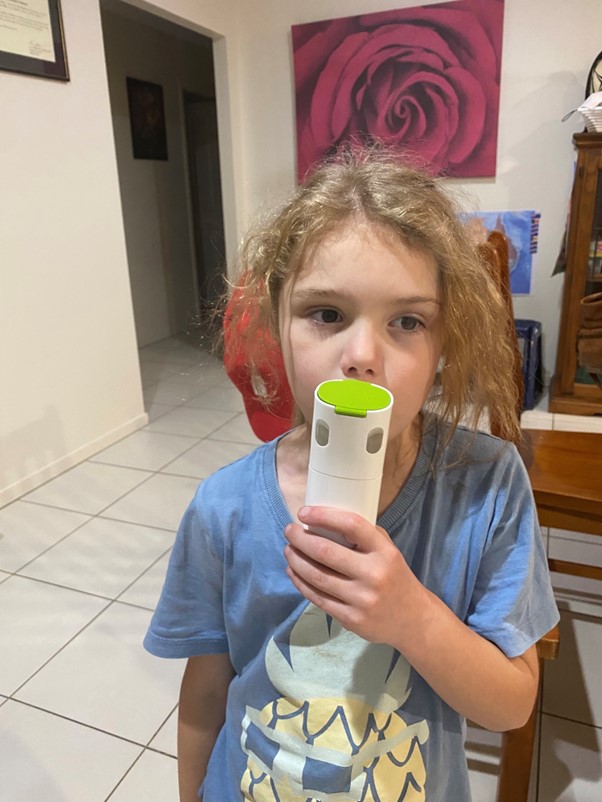 Child with blue shirt